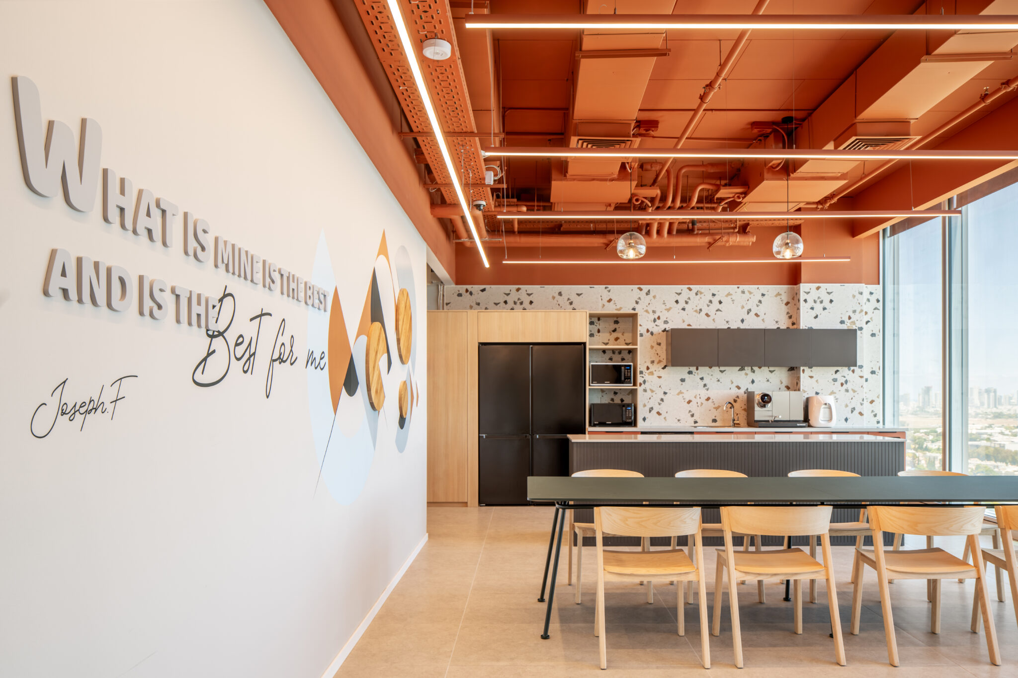 3D quote lettering and circle graphics on the dining area wall