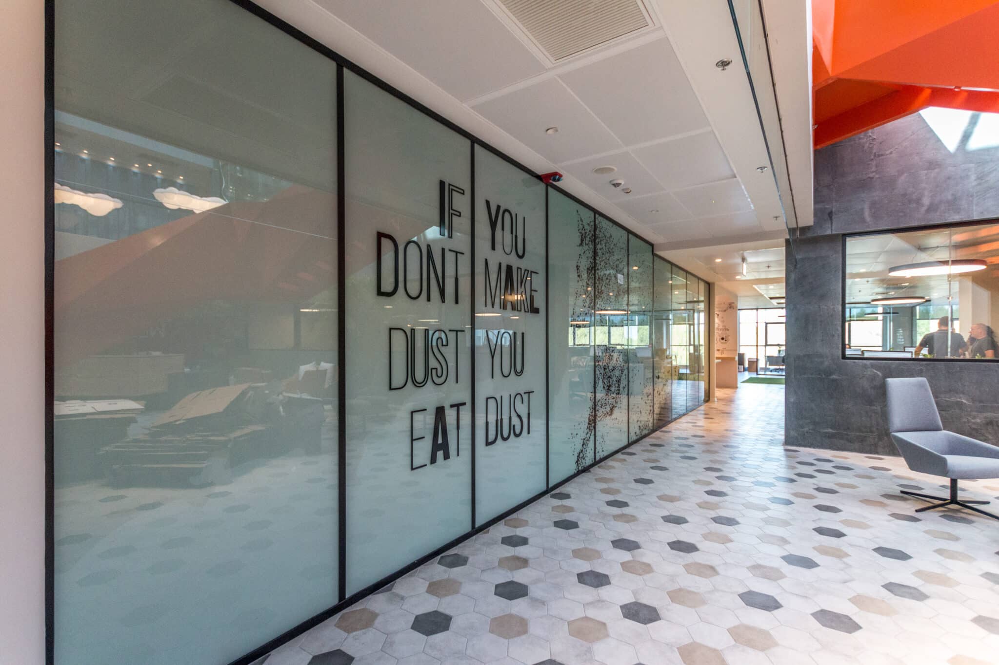 IF YOU DONT MAKE DUST slogan printed on frosted glass partitions