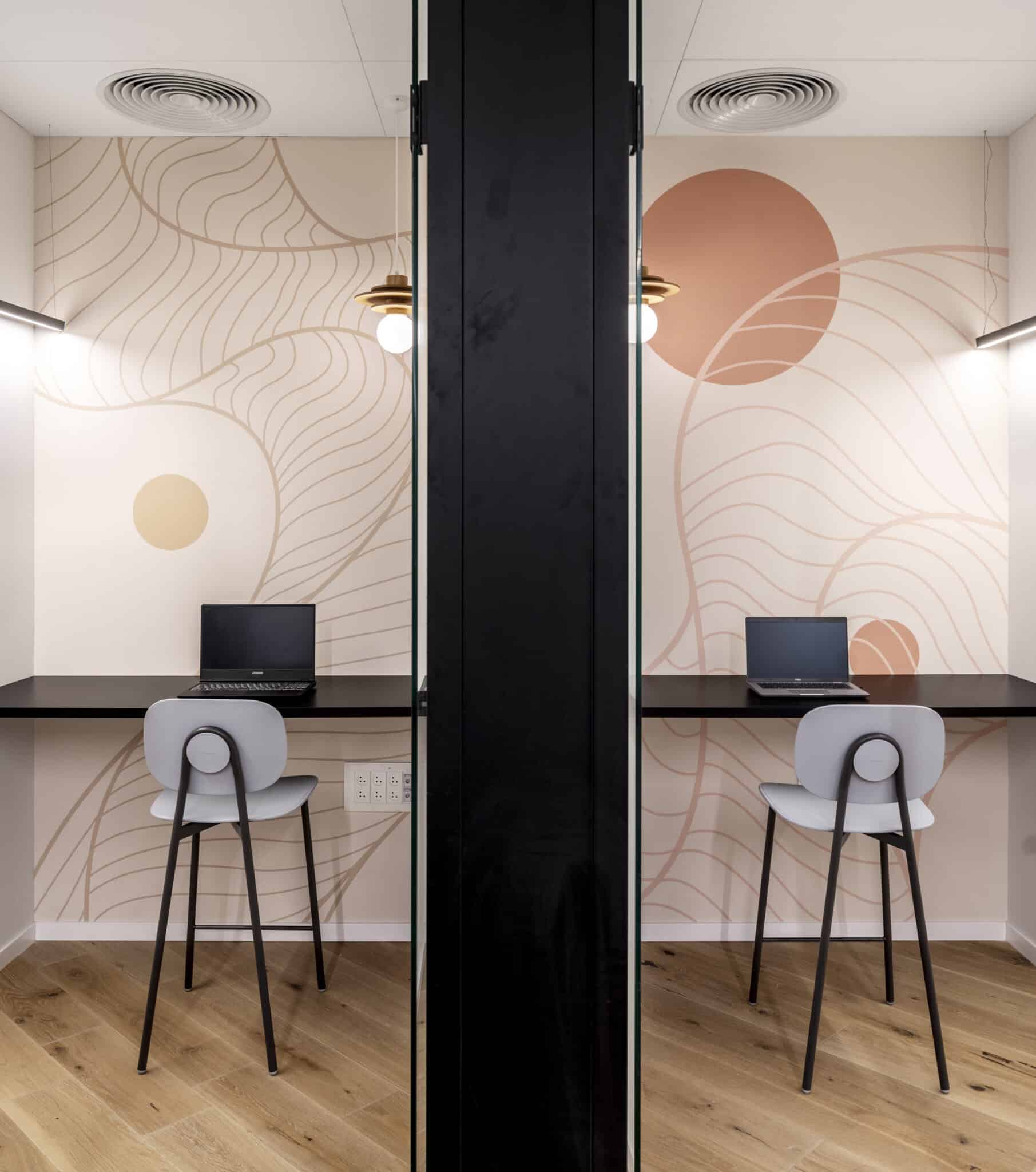 Flowing line wall graphics in two phone booths
