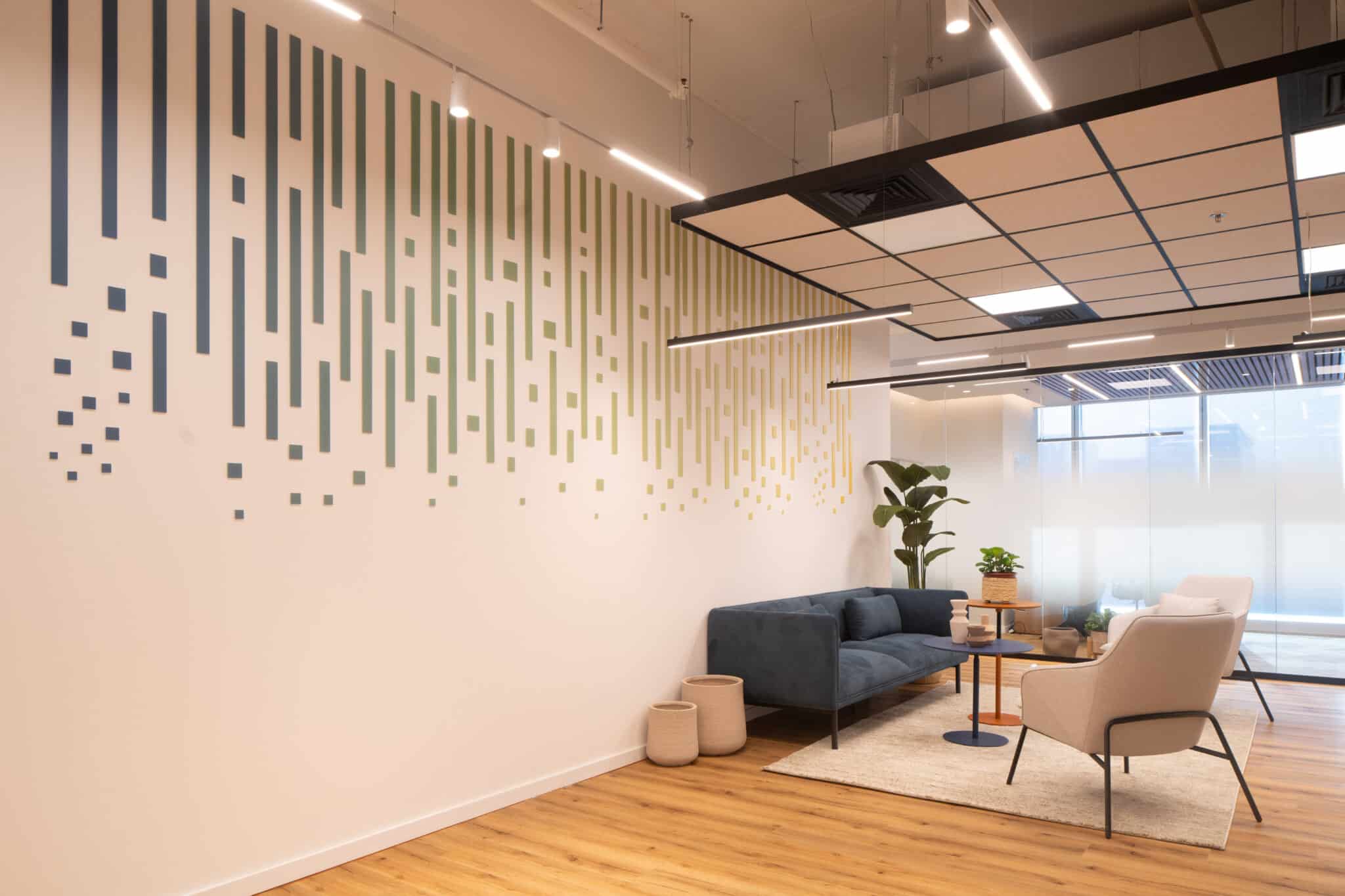 Gradient stripe wall graphic running from navy to yellow