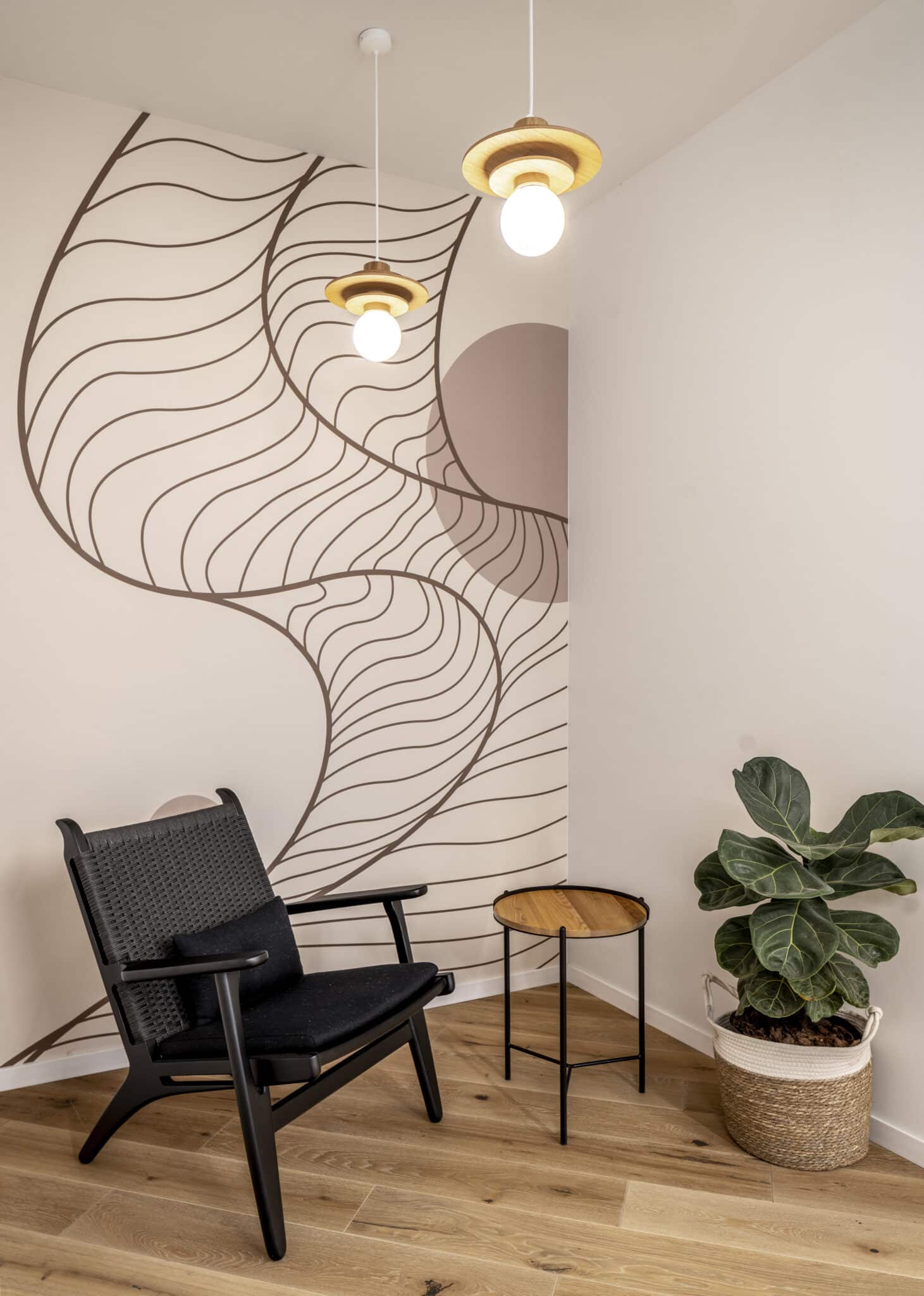 Sweeping line wall graphic wrapping a lounge corner