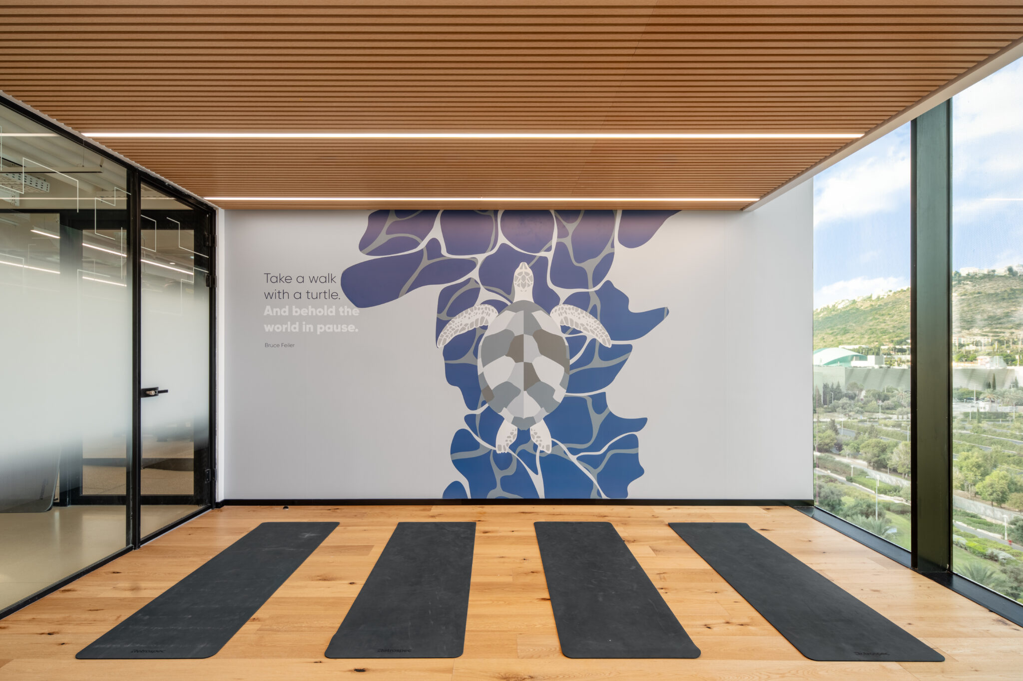 Turtle wall graphic with a quote in an office yoga room
