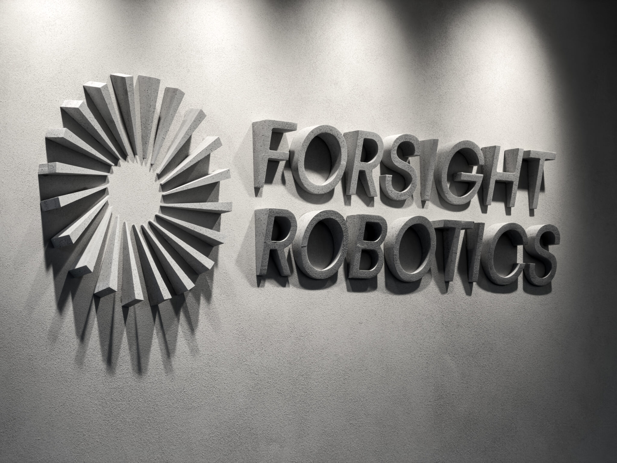 Forsight Robotics 3D logo with a radial element on a concrete wall