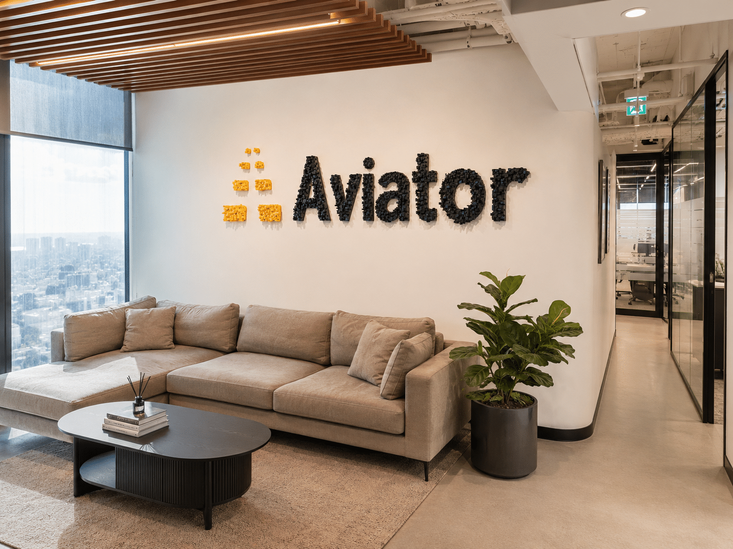 Aviator 3D logo built from small blocks on a lounge wall